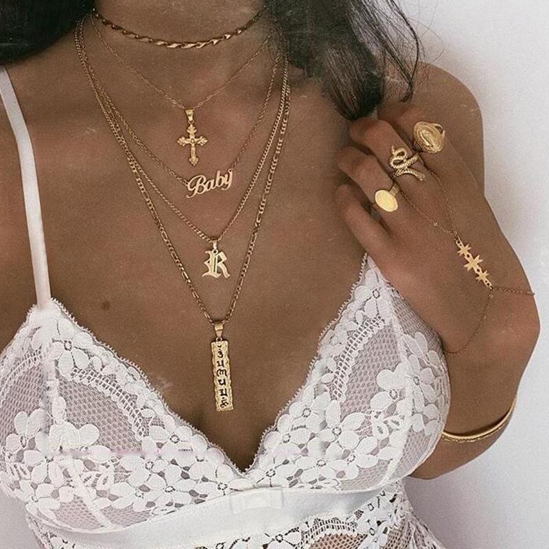 Gold baby hot sale cross necklace